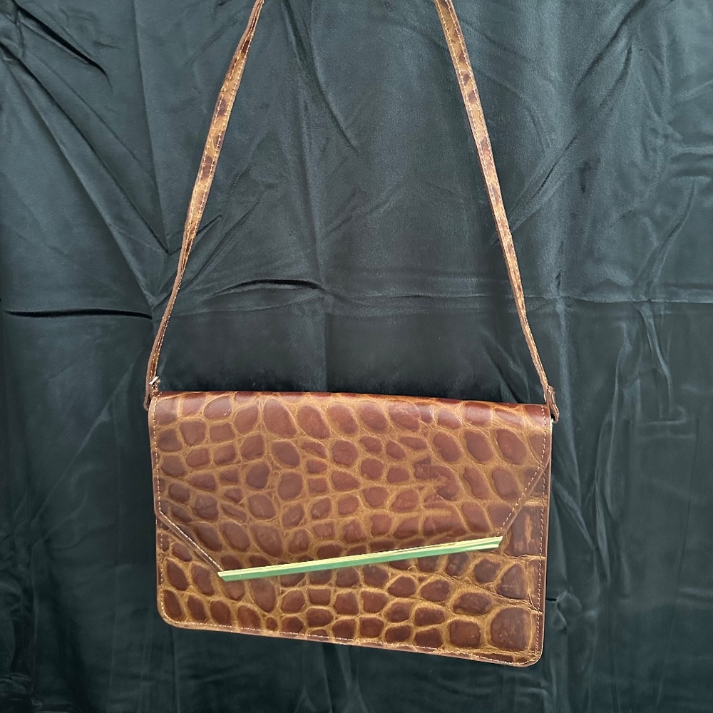Vintage, leather, alligator embossed envelope style purse.